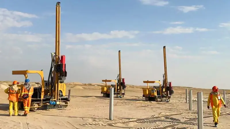 Solar Pile Driver is driving piles at a photovoltaic farm