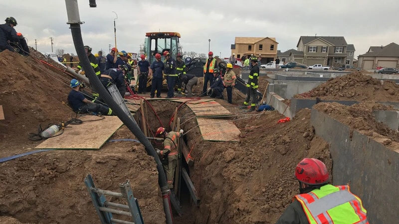 Backhoe trenching
