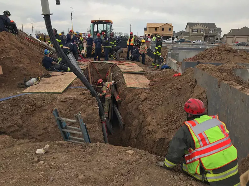 Backhoe trenching