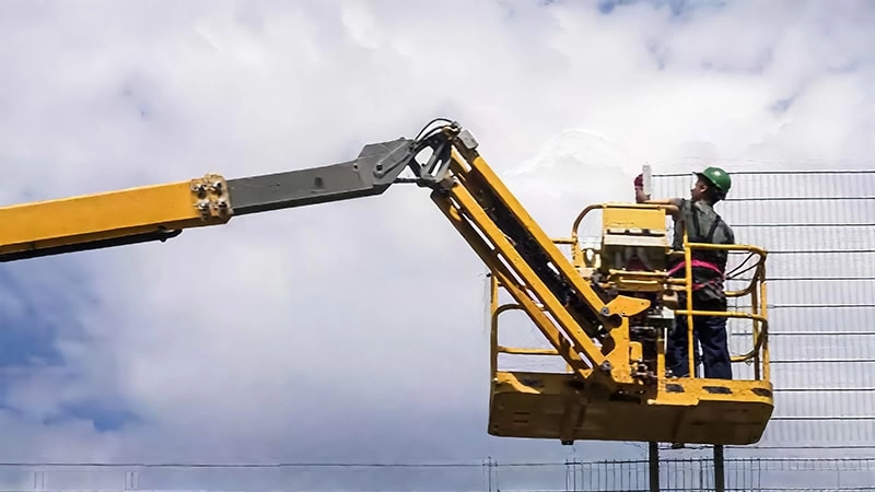 When installing taller guardrails, the boom lift delivers workers to the working height.