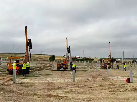 Photo of the solar pile project installed by a pile driver