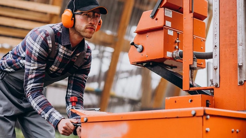 Man manipulating a machine