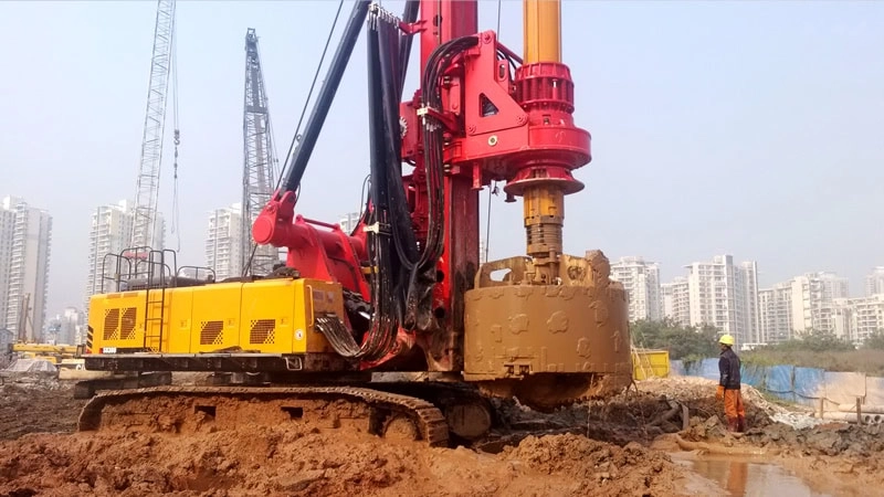 The soil bucket is working at the construction site.